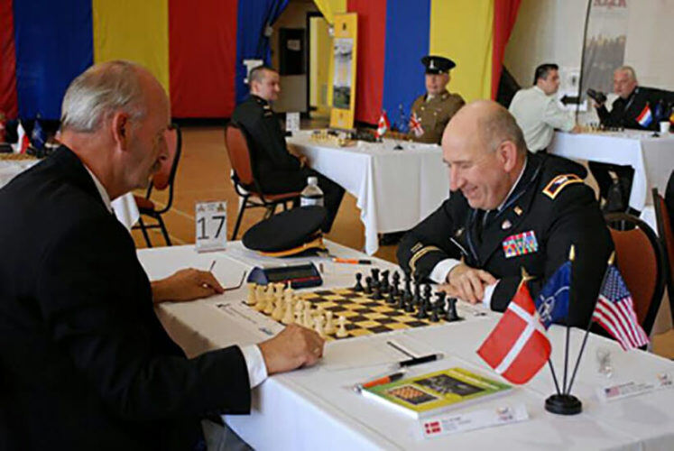 Driver David Hater provides package delivery services and plays chess
