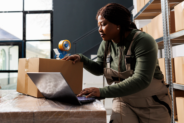 african-american-worker-checking-storehouse-logist-2025-02-17-08-39-46-utc-WEB