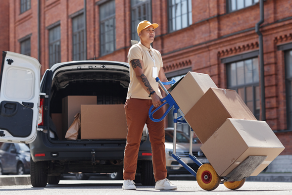 portrait-of-female-delivery-worker-2025-03-06-04-17-22-utc-WEB